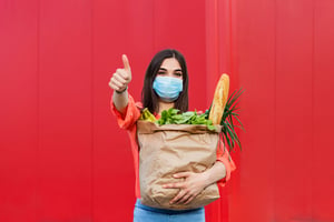 woman-grocerybag-red-thumbsup
